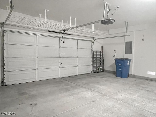 garage featuring a garage door opener and electric panel