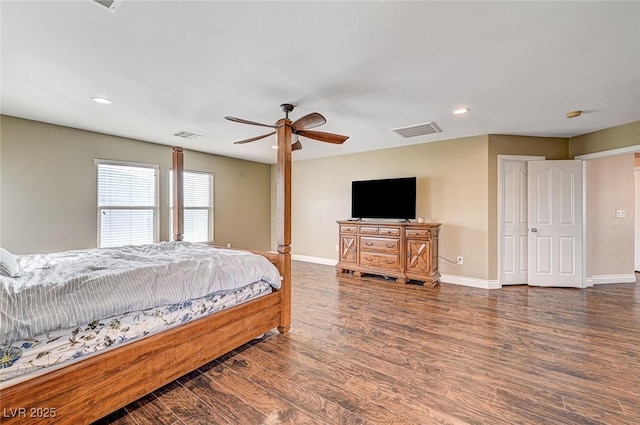 bedroom with dark wood-type flooring and ceiling fan