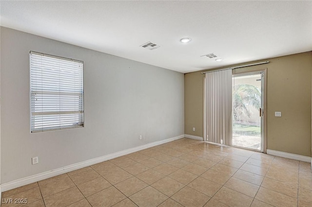 view of tiled spare room