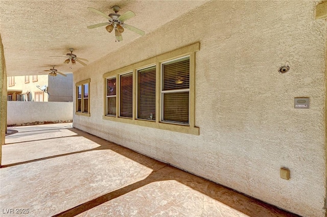 view of patio / terrace featuring ceiling fan