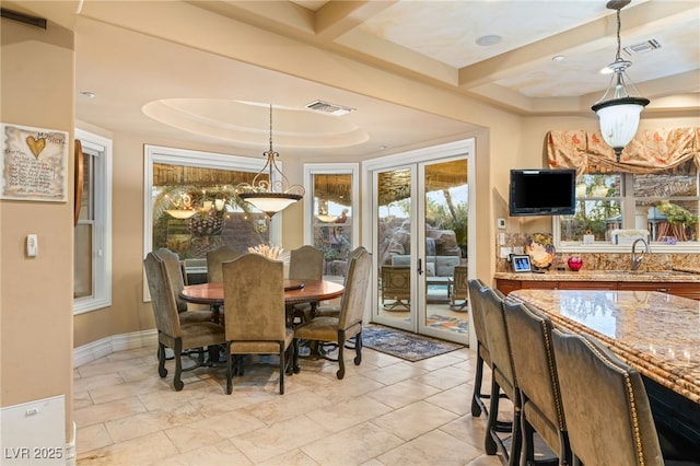 609 China Doll Pl, Henderson, NV 89012 - dining space featuring a raised ceiling and sink