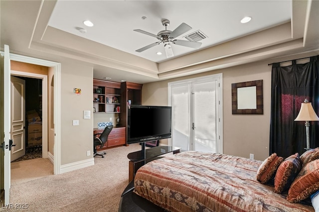 609 China Doll Pl, Henderson, NV 89012 - carpeted bedroom featuring a tray ceiling and ceiling fan