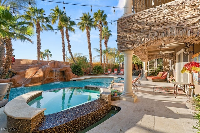 609 China Doll Pl, Henderson, NV 89012 - view of swimming pool featuring an in ground hot tub, pool water feature, ceiling fan, and a patio area