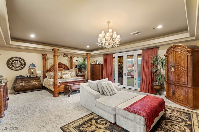 609 China Doll Pl, Henderson, NV 89012 - carpeted bedroom with an inviting chandelier, a tray ceiling, and access to exterior