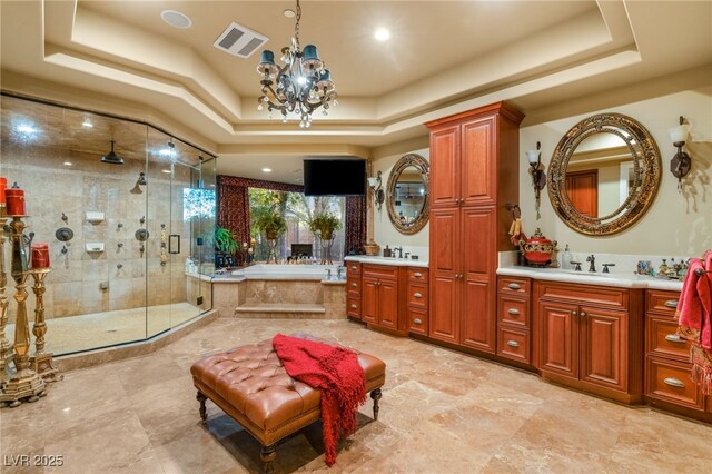 609 China Doll Pl, Henderson, NV 89012 - bathroom featuring a raised ceiling, plus walk in shower, and a chandelier
