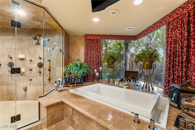 609 China Doll Pl, Henderson, NV 89012 - bathroom with separate shower and tub and tile walls