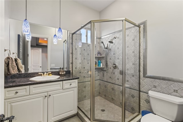 609 China Doll Pl, Henderson, NV 89012 - bathroom featuring tile walls, vanity, toilet, and walk in shower