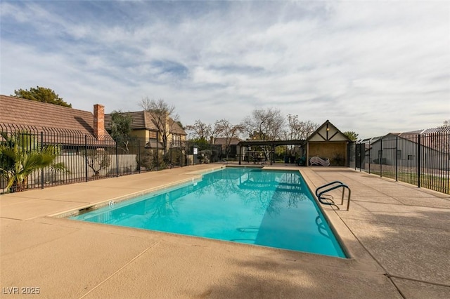 view of pool featuring a patio area