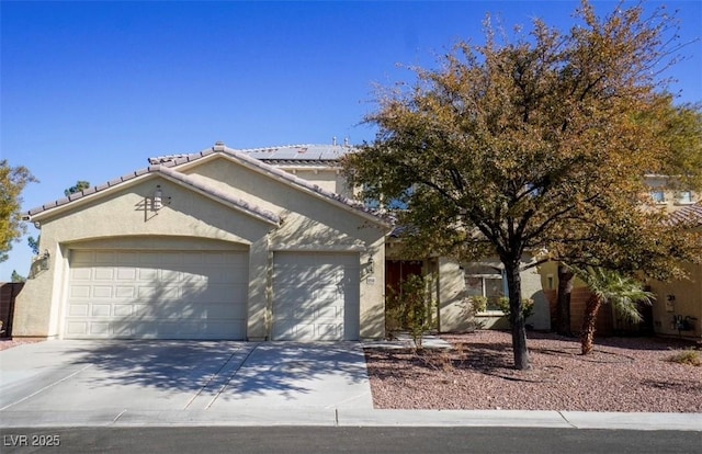 view of front of home with a garage