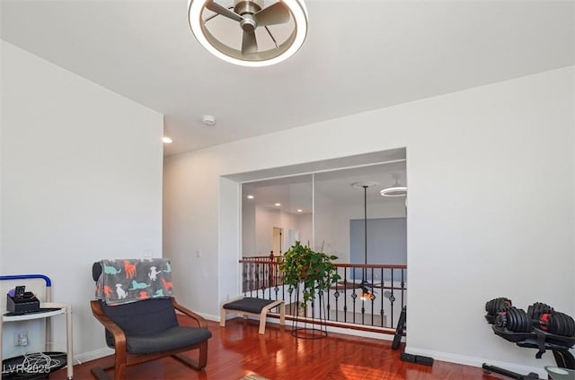 living area featuring hardwood / wood-style floors