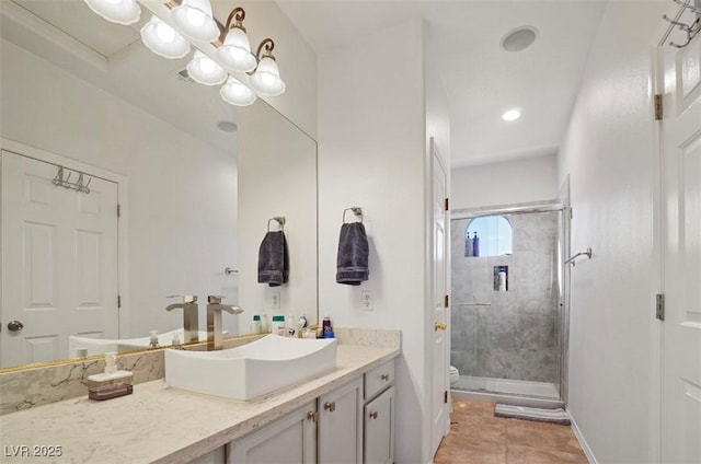 bathroom featuring an enclosed shower, vanity, a notable chandelier, tile patterned floors, and toilet