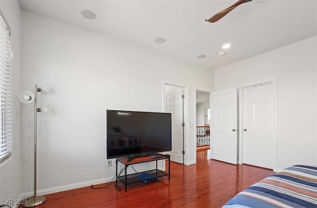 bedroom with hardwood / wood-style flooring and ceiling fan