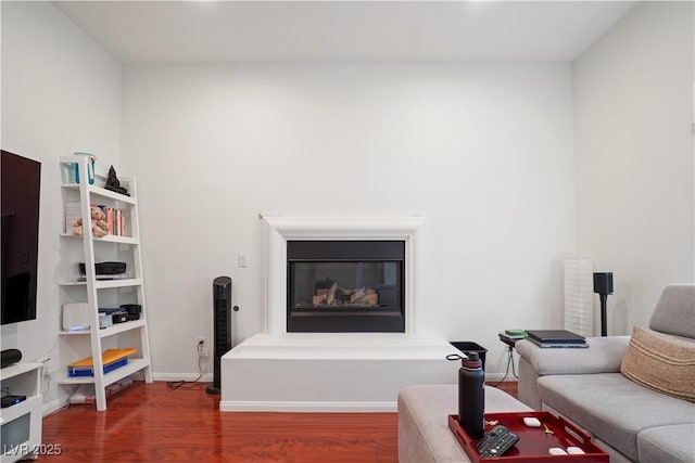 living room with dark hardwood / wood-style flooring