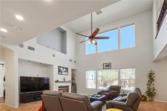 living room featuring ceiling fan