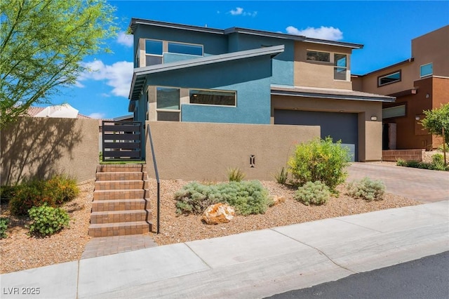 contemporary house featuring a garage