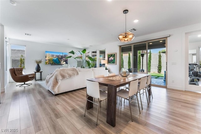 dining room featuring light hardwood / wood-style floors