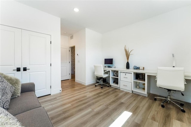 office space featuring light hardwood / wood-style flooring