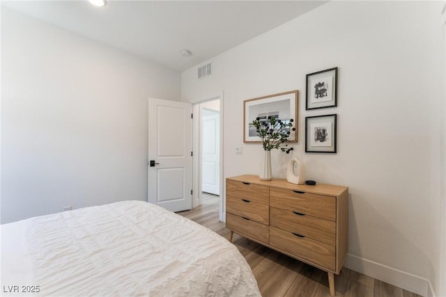 bedroom featuring light hardwood / wood-style flooring