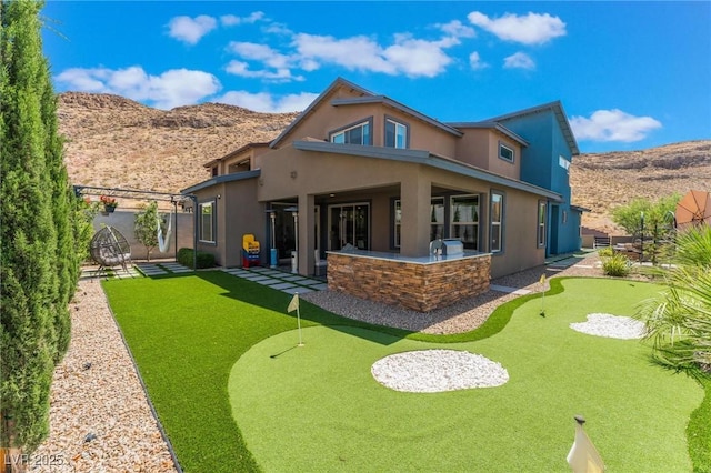 back of house featuring a patio