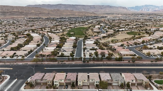 bird's eye view featuring a mountain view and a residential view