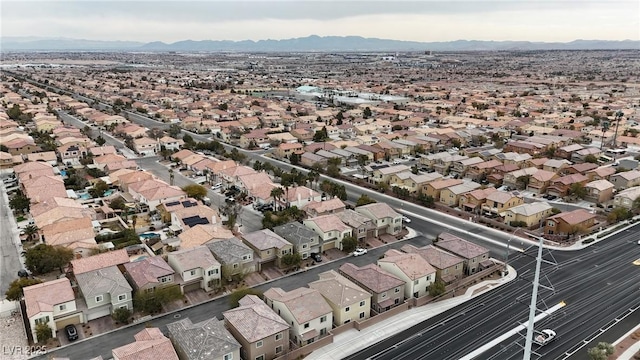 bird's eye view with a residential view and a mountain view