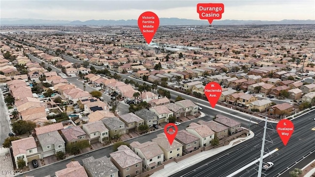 aerial view featuring a residential view and a mountain view