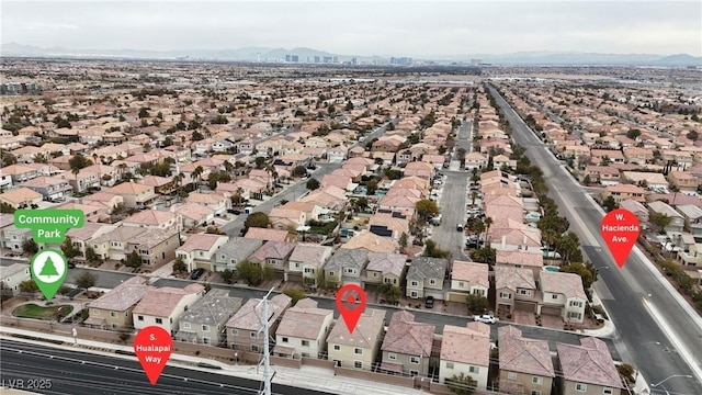 aerial view featuring a residential view and a mountain view