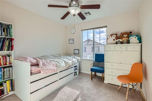 carpeted bedroom with ceiling fan