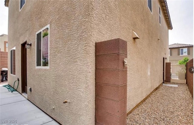 view of home's exterior featuring a patio area