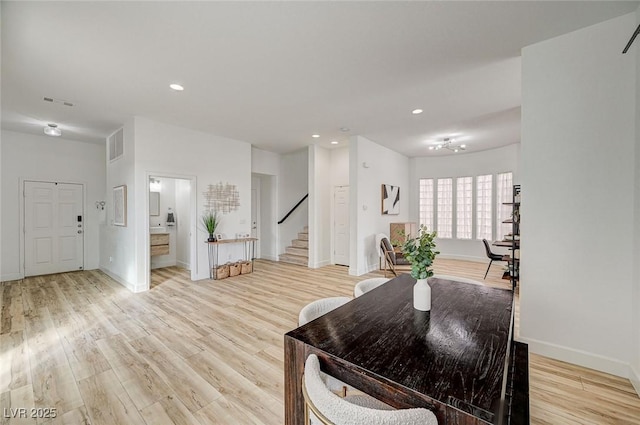 dining space featuring light hardwood / wood-style floors