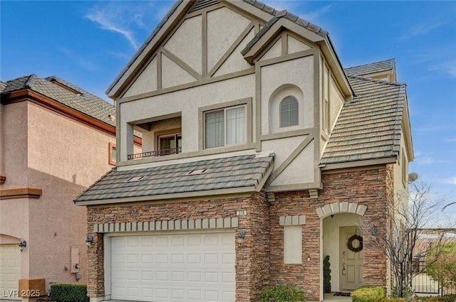 tudor-style house with a garage