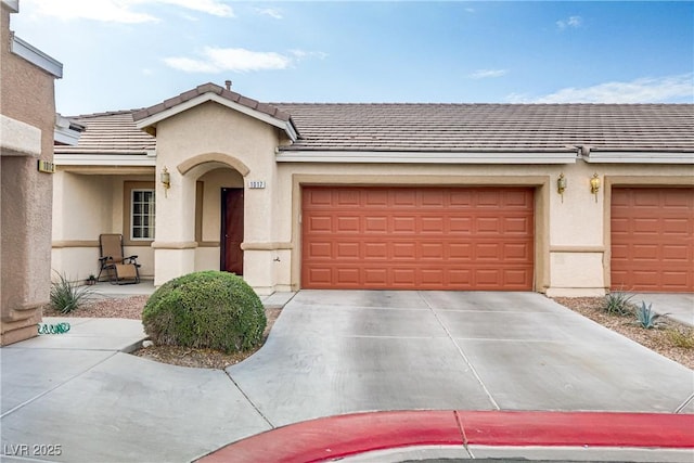 ranch-style home with a garage