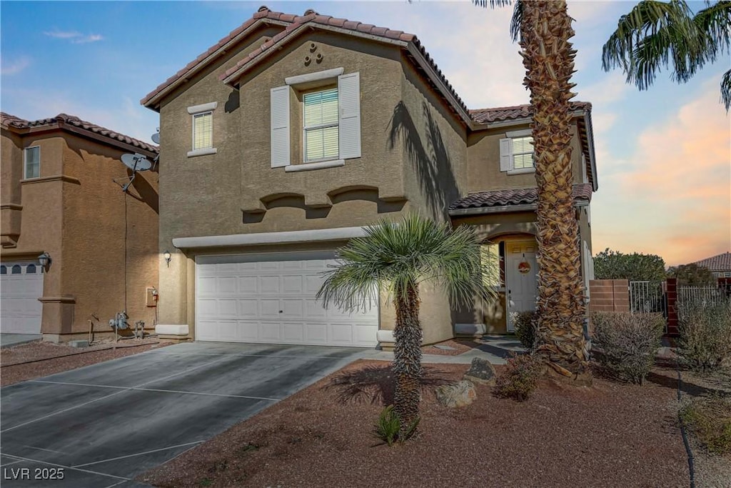 view of front of home with a garage