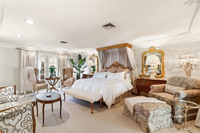 carpeted bedroom featuring crown molding and french doors