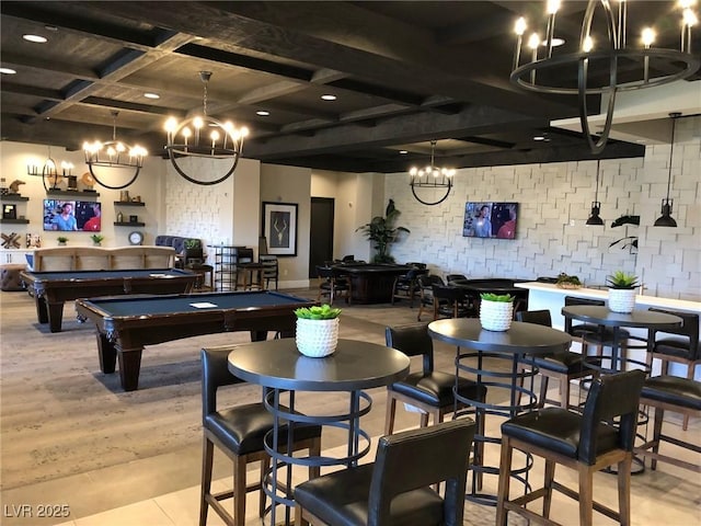 rec room with light tile patterned floors, billiards, beam ceiling, coffered ceiling, and a chandelier