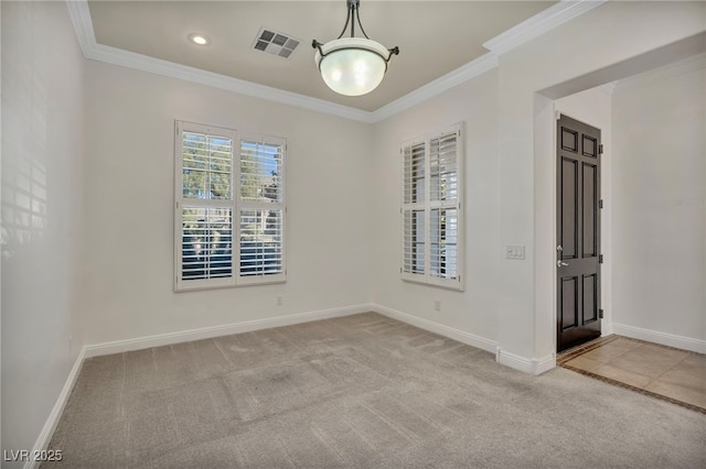 carpeted empty room with crown molding