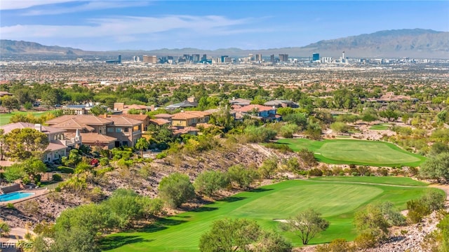 birds eye view of property featuring a mountain view