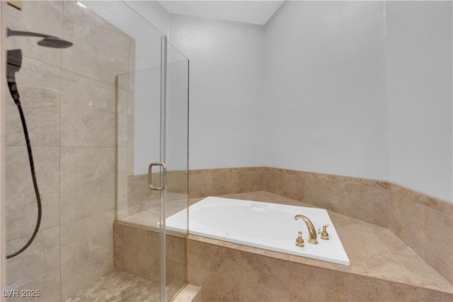 bathroom with independent shower and bath