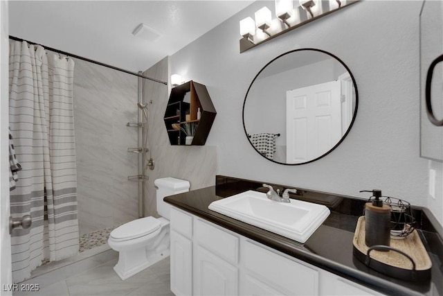 bathroom with vanity, toilet, and a shower with shower curtain