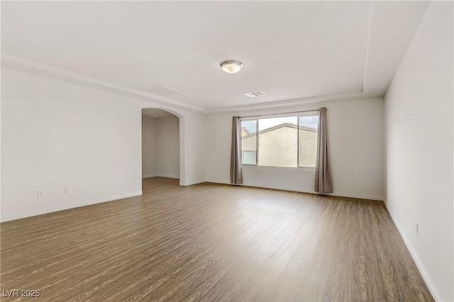 empty room featuring hardwood / wood-style floors