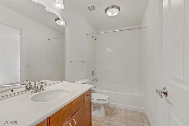 full bathroom with vanity, tile patterned floors, bathing tub / shower combination, and toilet