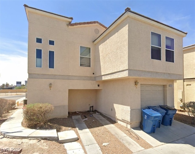 exterior space with a garage