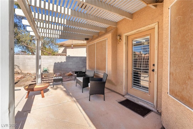 view of patio featuring an outdoor living space and a pergola