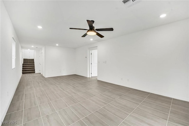 spare room featuring ceiling fan