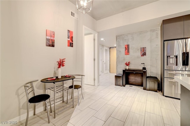 interior space featuring an inviting chandelier