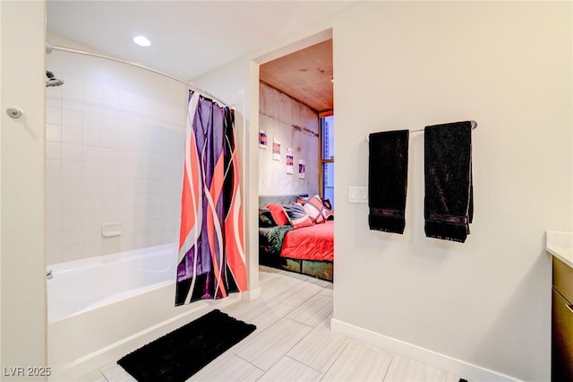 bathroom with vanity and shower / bath combo