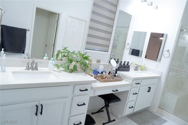 bathroom featuring vanity and a shower with shower door