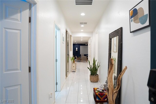 hallway with light tile patterned flooring