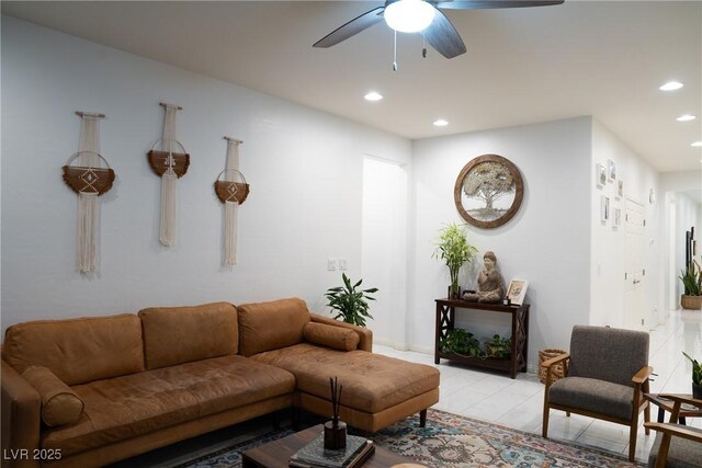 living room with light tile patterned flooring and ceiling fan