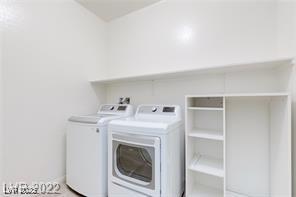 laundry area featuring separate washer and dryer